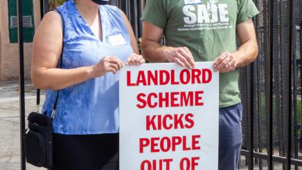 Supporters holding sign