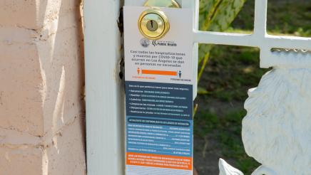 Spanish language door hanger