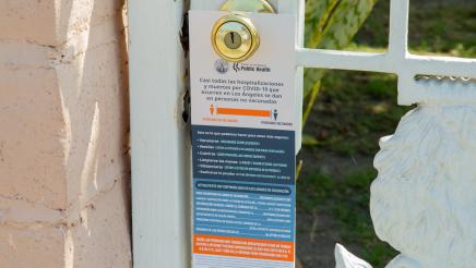 Spanish language door hanger