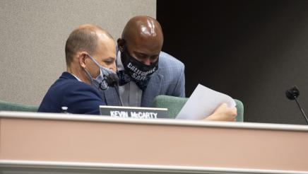 Asm. Gipson converses with Asm. McCarty