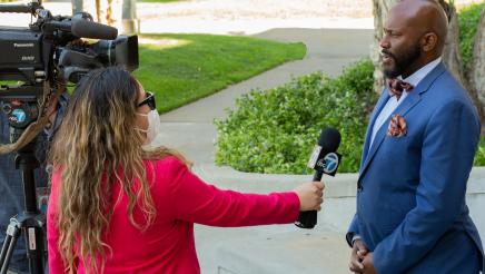 Asm. Gipson being interviewed by press member