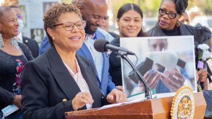 Congresswoman Karen Bass at podium, speaking