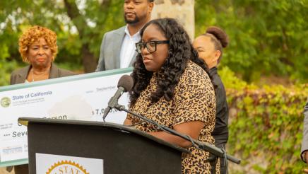 Guest speaker at podium, speaking