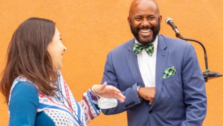 Asm. Gipson shares a light moment with a guest speaker
