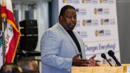 Guest speaker at podium, speaking