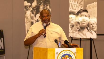 Guest speaker at podium, speaking