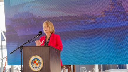 Guest speaker at podium, speaking