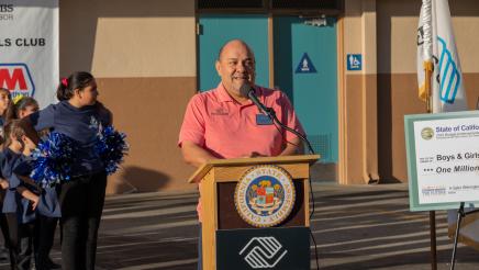 Board member Sergio Carrillo at podium, speaking
