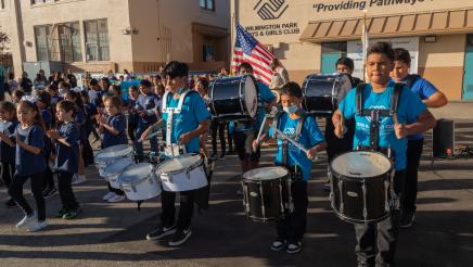 Band players and kids parading