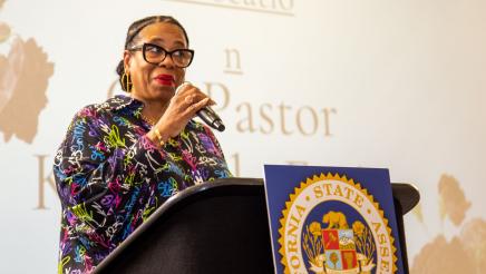 Guest speaker at podium, speaking