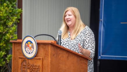 Guest speaker at podium, speaking