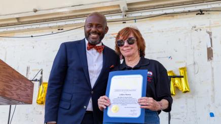 Asm. Gipson presenting SBCC representative with an Assembly resolution