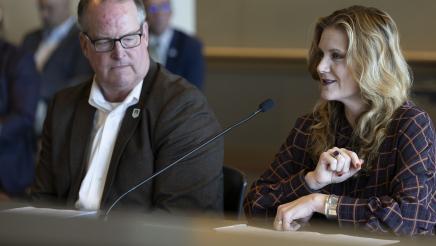 Aubrey Bettencourt (Almond Alliance Ports), seated with James Johansson at left, speaking