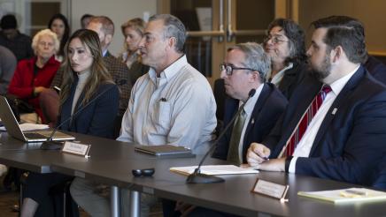 Alex Podolsky (Ameresco Ports), seated with other witnesses, speaking