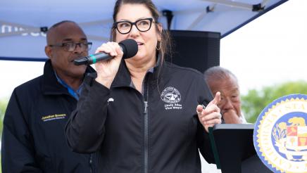 Vice Mayor Cindy Allen holding microphone, speaking