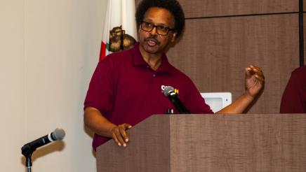 Guest speaker at podium, speaking