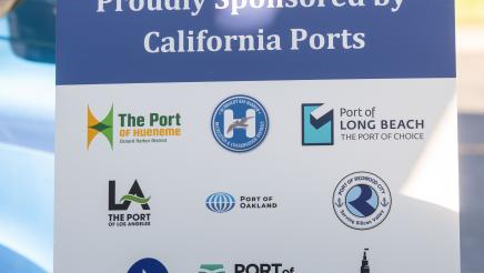 Poster board on stand, containing logos of multiple CA ports