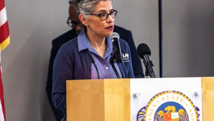 Guest speaker at podium, speaking