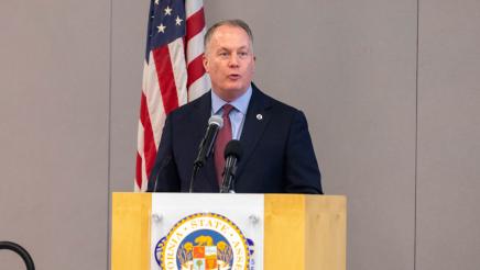 Guest speaker at podium, speaking