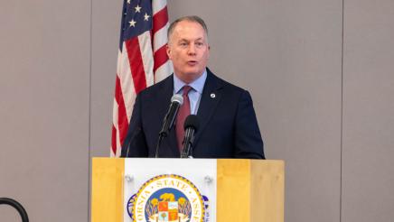 Guest speaker at podium, speaking