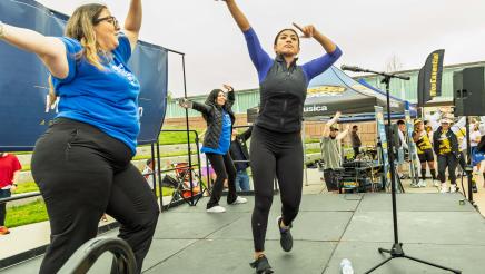 Exercise leaders onstage