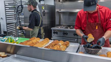 Kitchen staff preparing food